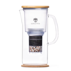 A side view of the ENYA water filter pitcher, showcasing its glass carafe, sustainable bamboo lid, and internal filter cartridge.