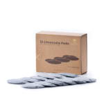 A box of 12 Lotus Vita limescale pads with several individual pads designed for the ENYA water filter arranged in the foreground.