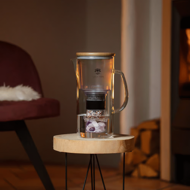 The Lotus Vita Crystal Holder, filled with rose quartz, rock crystal, and amethyst gemstones, designed for the ENYA water pitcher.